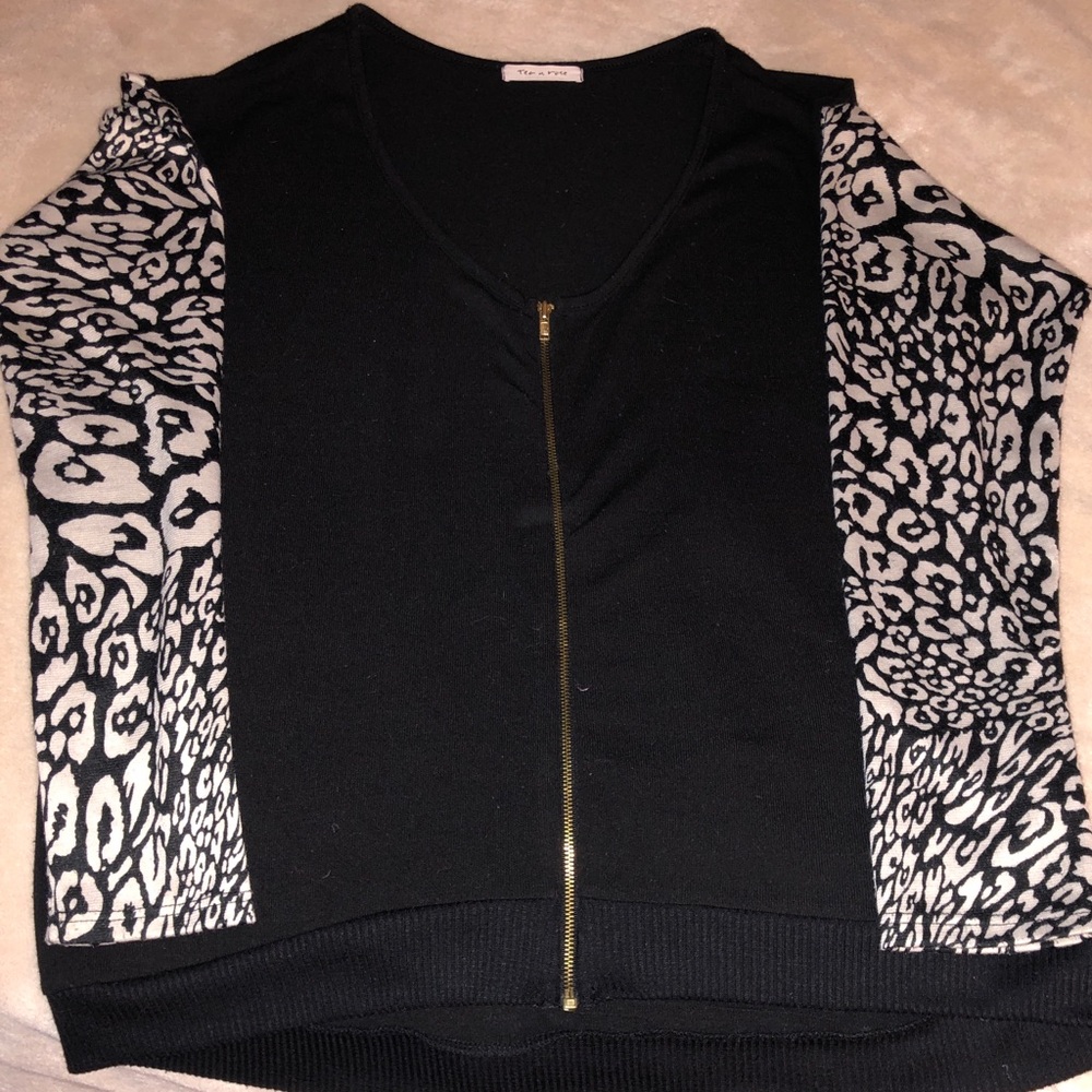 Black and animal print sweater blouse